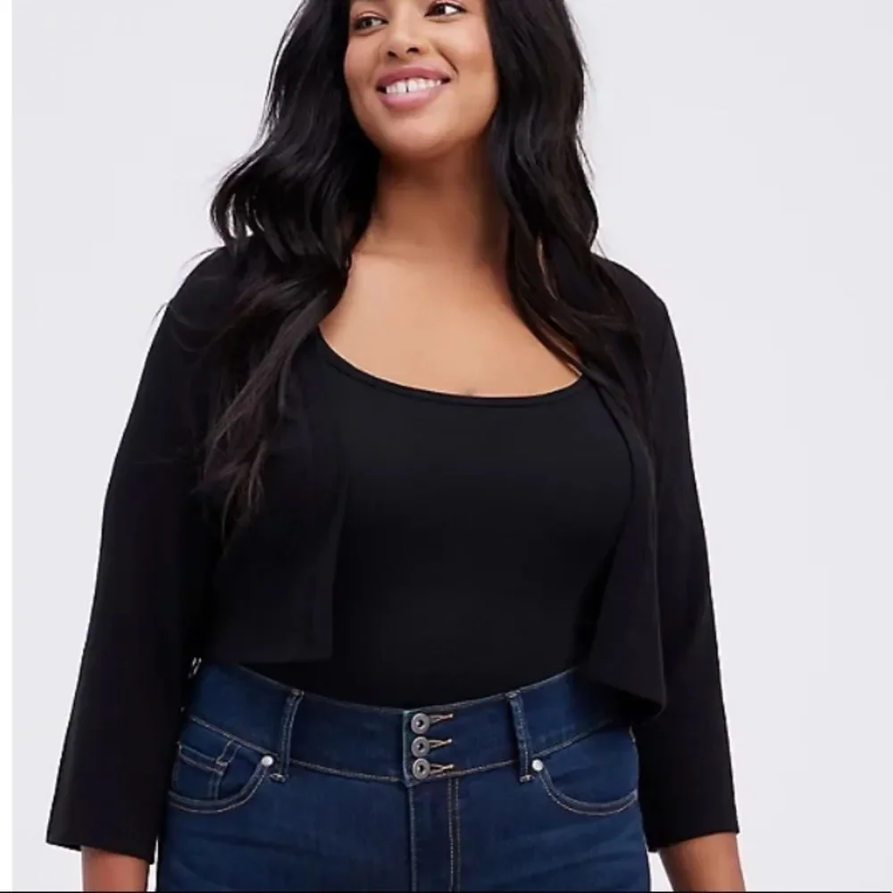 Torrid stretch bolero shrug.